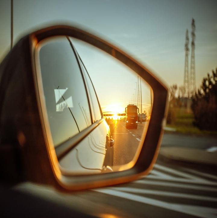car mirror highway long distance trip